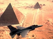 fighter over pyramids