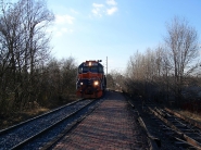 train-approaching-bridge